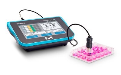 Photograph of a Millicell ERS 3.0 Digital Voltohmmeter, with standing in-well probe in a 24-well plate of cell culture inserts. Photograph of a Millicell ERS 3.0 Digital Voltohmmeter, with standing in-well probe in a 24-well plate of cell culture inserts.