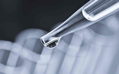 Water in the Lab Pipette with water drop for genomic analysis