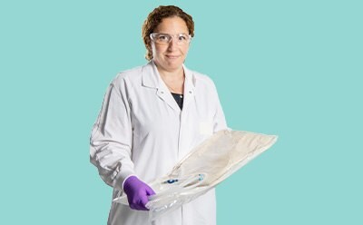 Scientist holding a ReadyStream media bag