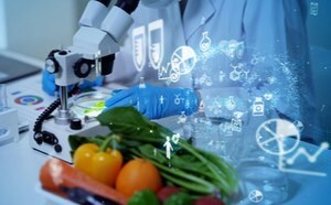 The image depicts a scientist in a laboratory setting, meticulously examining fresh vegetables under a microscope.