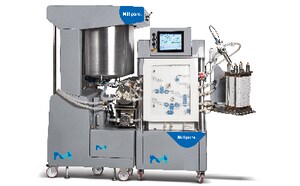 An industrial pharmaceutical machine with a large mixing vessel, control panel, and various tubes and attachments.