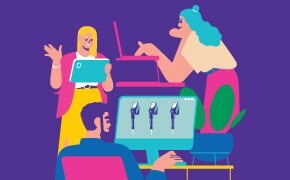 An illustration of three diverse individuals collaborating in a modern workspace. One person, a woman with long blonde hair, is holding a tablet and speaking animatedly. Another woman with blue hair is pointing at a laptop, while a man sits at a desk, looking at a computer screen displaying images.