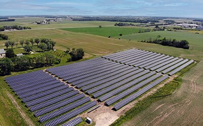 An aerial view of a solar farm An aerial view of a solar farm