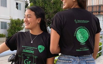 Two female students wearing T-shirts for the non-profit organization Beyond Benign Two female students wearing T-shirts for the non-profit organization Beyond Benign