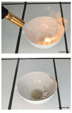 Treatment of tributylmethylphosphonium dibutylphosphate by a gas burner flame for 60 seconds. Treatment of tributylmethylphosphonium dibutylphosphate by a gas burner flame for 60 seconds.