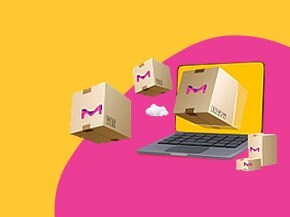 A laptop with an open screen displaying a vibrant yellow background. Surrounding the laptop are several cardboard boxes with the Merck logo, suggesting a theme of shipping or logistics. The boxes appear to be floating, creating a dynamic visual effect.
